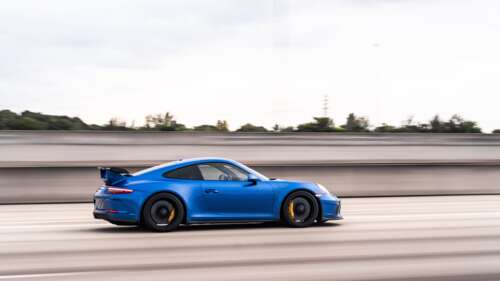Um carro esportivo Porsche GT3 RS de alto desempenho, com um design aerodinâmico... 8K