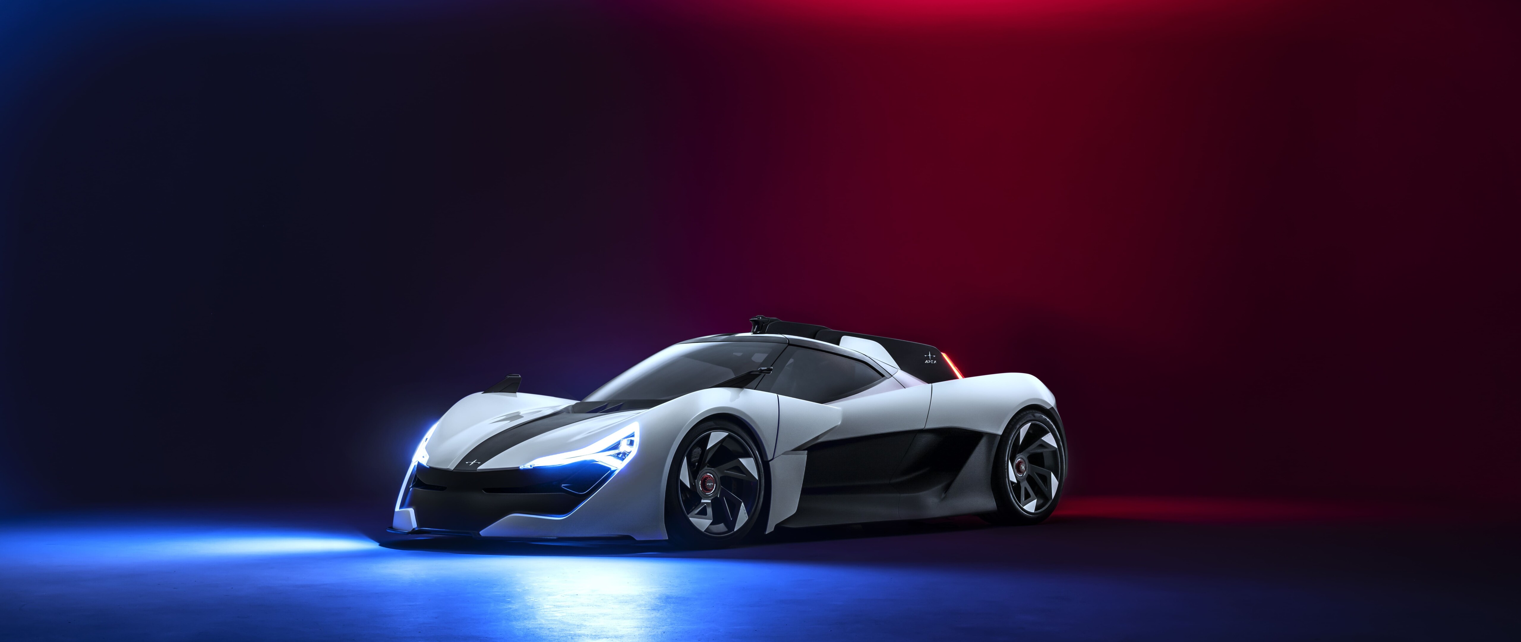 Um elegante e aerodinâmico carro esportivo moderno, fotografado num estúdio profissional.